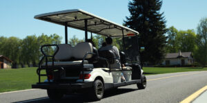 Golf carts are no longer just a staple of the green fairways. Across many American communities, golf carts and low-speed vehicles (LSVs) have become common modes of transportation for short-distance travel. Whether you're cruising around a beach town, zipping through a gated community, or using a golf cart for short errands, driving a golf cart or LSV on the road comes with a unique set of responsibilities. With an increasing number of jurisdictions allowing street-legal golf carts and LSVs on roads—typically those marked 35 mph or lower—it’s crucial to practice proper road etiquette. While golf carts are smaller, slower, and often easier to maneuver than traditional cars, they still operate in the same shared space. This means that golf cart drivers need to follow standard road rules and show courtesy to other motorists to ensure everyone’s safety. In this article, we’ll cover the key points of golf cart etiquette, providing you with essential tips for driving your golf cart safely and respectfully when sharing the road with cars. Understanding the Basics of Golf Cart and LSV Etiquette Driving a golf cart on the road is a privilege that comes with its own set of rules and responsibilities. Unlike traditional golf carts used solely for the course, street-legal golf carts and LSVs are modified to meet legal requirements for road travel. This includes things like seat belts, headlights, turn signals, rearview mirrors, and proper registration. Although these vehicles can legally operate on specific roads, it’s important to remember they are still slower and less robust than cars. This makes understanding and practicing road etiquette essential. 1. Know Your Local Laws Before you even hit the road, it’s critical to familiarize yourself with the specific golf cart and LSV laws in your area. While most jurisdictions limit golf carts to roads with speed limits of 35 mph or lower, some areas may have stricter regulations, limiting them to even slower streets. Additionally, some municipalities require specific permits, stickers, or registrations to make your golf cart road-legal. Make sure you also understand the restrictions regarding where golf carts can be driven, as some areas prohibit them from primary roads entirely. Always carry the necessary documentation, including proof of insurance and registration, in case you’re stopped by law enforcement. 2. Use Proper Signals Just like when driving a car, it’s essential to use proper signals when operating a golf cart or LSV on the road. This means signaling when you plan to turn or change lanes. Most street-legal golf carts and LSVs are equipped with turn signals, but if yours isn’t, you’ll need to use hand signals to indicate your intentions to other drivers. Here’s a quick refresher on hand signals: Left Turn: Extend your left arm straight out to the side. Right Turn: Extend your left arm out with your elbow bent and your hand pointing upward. Stop: Extend your left arm out with your elbow bent and your hand pointing downward. Being predictable and clearly communicating your intentions to other drivers is key to preventing accidents and ensuring a smooth flow of traffic. 3. Stay in Your Lane and Follow Traffic Flow While golf carts are smaller than most vehicles on the road, they are still expected to stay in their lane and follow the natural flow of traffic. Do not ride on the shoulder unless local laws permit it, and avoid swerving in and out of lanes. Golf carts and LSVs typically have a maximum speed of around 20-25 mph, meaning you’re often driving slower than surrounding traffic. To avoid causing disruptions, it’s important to drive as far to the right as possible without going into unsafe areas like ditches or soft shoulders. Stay alert and aware of cars approaching from behind, and always follow the speed limit. 4. Pull Off to Let Traffic Pass One of the most important rules of golf cart etiquette is to pull off the road when safe to let faster-moving cars pass. It can be frustrating for drivers stuck behind a slow-moving golf cart, especially in areas where passing isn’t allowed or there’s only one lane. If you notice a line of cars building up behind you, the courteous thing to do is to find a safe place to pull off to the side of the road and let them pass. This could be a driveway, parking lot, or wide shoulder—just make sure it’s safe and legal to stop. This small act of consideration can go a long way in reducing frustration for other drivers and keeping the road safe for everyone. 5. Be Aware of Your Surroundings Golf carts and LSVs offer an open-air experience, but this also means you need to be even more vigilant about your surroundings. Always check your mirrors and look over your shoulder before making a turn or lane change. Since golf carts are slower and less visible than traditional vehicles, it’s important to take extra caution when merging into traffic or crossing intersections. Additionally, be mindful of pedestrians and cyclists. In many communities, golf carts share space with bike lanes and pedestrian walkways, so always yield to foot traffic and cyclists when necessary. Avoid distractions like texting or eating while driving—just because you’re in a smaller vehicle doesn’t mean the risks are any less real. 6. Obey All Traffic Signals and Signs This should go without saying, but sometimes the relaxed nature of golf cart driving can lead to a more casual attitude toward following the rules of the road. When driving a golf cart or LSV, always obey all traffic signals and signs, just as you would in a car. This includes stopping at stop signs, yielding at crosswalks, and adhering to speed limits. Traffic laws apply to golf carts and LSVs just as they do to any other vehicle, and failure to follow them can result in fines, penalties, or even accidents. 7. Avoid Driving in Hazardous Conditions Golf carts and LSVs are not built for all types of weather or road conditions. Avoid driving in heavy rain, fog, or at night unless your cart is equipped with the necessary safety features like headlights, taillights, and windshield wipers. Even then, it’s generally best to avoid driving in poor visibility conditions, as golf carts are less stable and more prone to accidents than larger vehicles in adverse weather. It’s also important to remember that golf carts should never be operated on highways or roads with high-speed traffic, even if you only need to cross the street. Always find alternative routes that are safer and more suitable for your vehicle. 8. Keep it Quiet and Respectful Golf carts and LSVs are often used in quiet, residential areas or tourist destinations where people come to relax and enjoy the surroundings. Part of being a responsible golf cart driver means keeping noise levels down. Avoid honking unnecessarily, blasting loud music, or revving the engine (if you have a gas-powered cart) in residential neighborhoods. Consideration for others is an important aspect of golf cart etiquette. 9. Passenger Safety While it’s tempting to pack a few extra passengers onto your golf cart for a fun ride, always adhere to the passenger limit of your vehicle. Overloading a golf cart can make it unstable, increasing the risk of tipping over or losing control. Ensure that all passengers are seated properly and that everyone is wearing seat belts if your golf cart is equipped with them. Also, make sure children and pets are safely seated. Standing or hanging onto the side of a moving golf cart is dangerous and should be avoided at all times. Conclusion: A Smoother Ride for All Driving a street-legal golf cart or LSV on public roads offers a convenient and eco-friendly way to get around, but it also requires a mindful approach to road safety and etiquette. By following these basic principles—signaling properly, pulling over when necessary, obeying traffic laws, and being considerate of other drivers—you can help ensure that everyone enjoys a smoother and safer ride. After all, part of the charm of using a golf cart is the relaxed, leisurely pace. So take your time, follow the rules, and enjoy the ride! Safe driving starts with good etiquette, and in the world of golf carts, that makes all the difference.